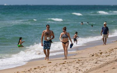 Why are Miami-Dade beaches that were to open still closed and tied to the curfew?