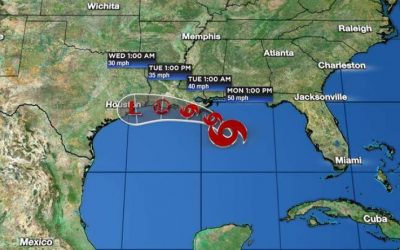 Hurricane Marco weakens back to storm; Laura begins moving through Cuba